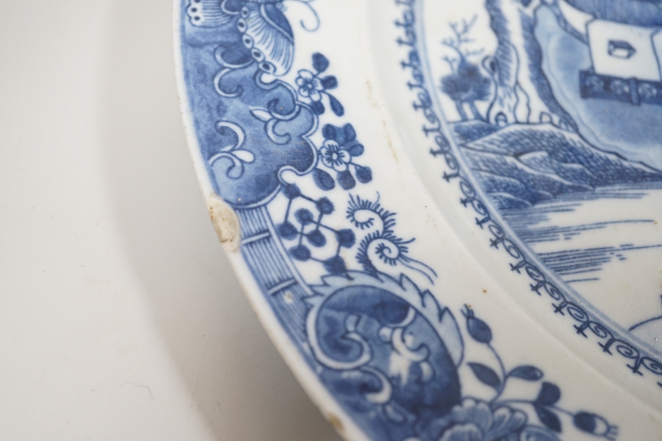 Two Chinese blue and white plates, 18th/19th century, largest 35cm